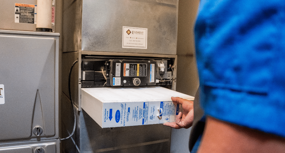 HVAC service provider replaces air filter